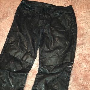 Black metallic snakeskin skinny jeans